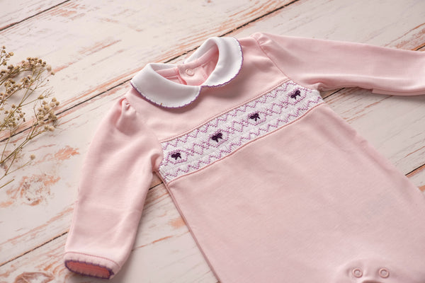 Baby Clothes Footed Jumpsuit in Pink with Smocked Details of Purple Bows in Pima Cotton