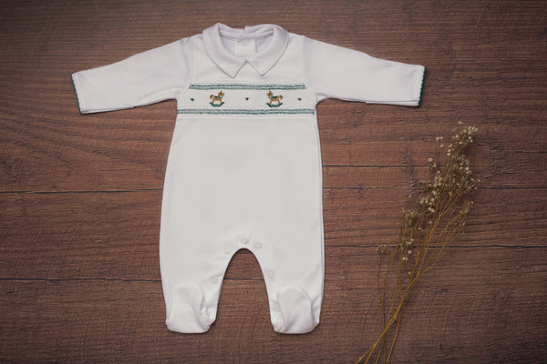 Baby Clothes Footed Jumpsuit in White with Green Smocked Details of Rocking Horses in Pima Cotton
