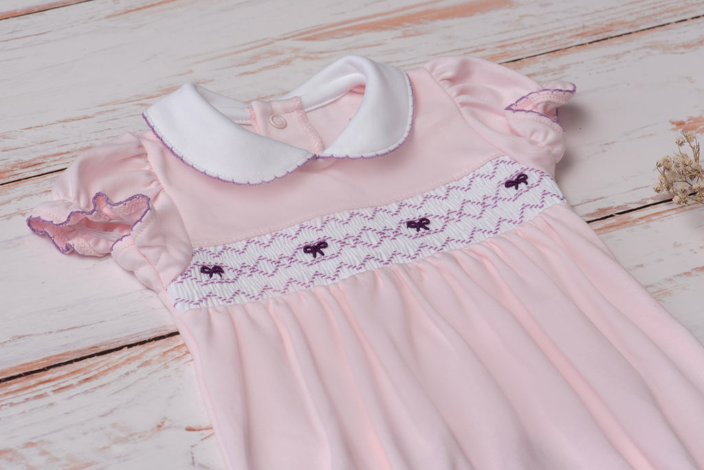 Baby Clothes Romper in Pink with Smocked Details of Purple Bows in Pima Cotton